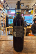 Nebbiolo Coste della Sesia DOC 750mL a dark glass wine bottle with a black and white label and black top