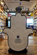 Casa de Hamsa Tequila Blanco 1L a white colored ceramic bottle shaped in the form of a hand