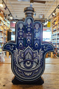 Casa de Hamsa Tequila Blanco 1L a blue colored ceramic bottle shaped in the form of a hand