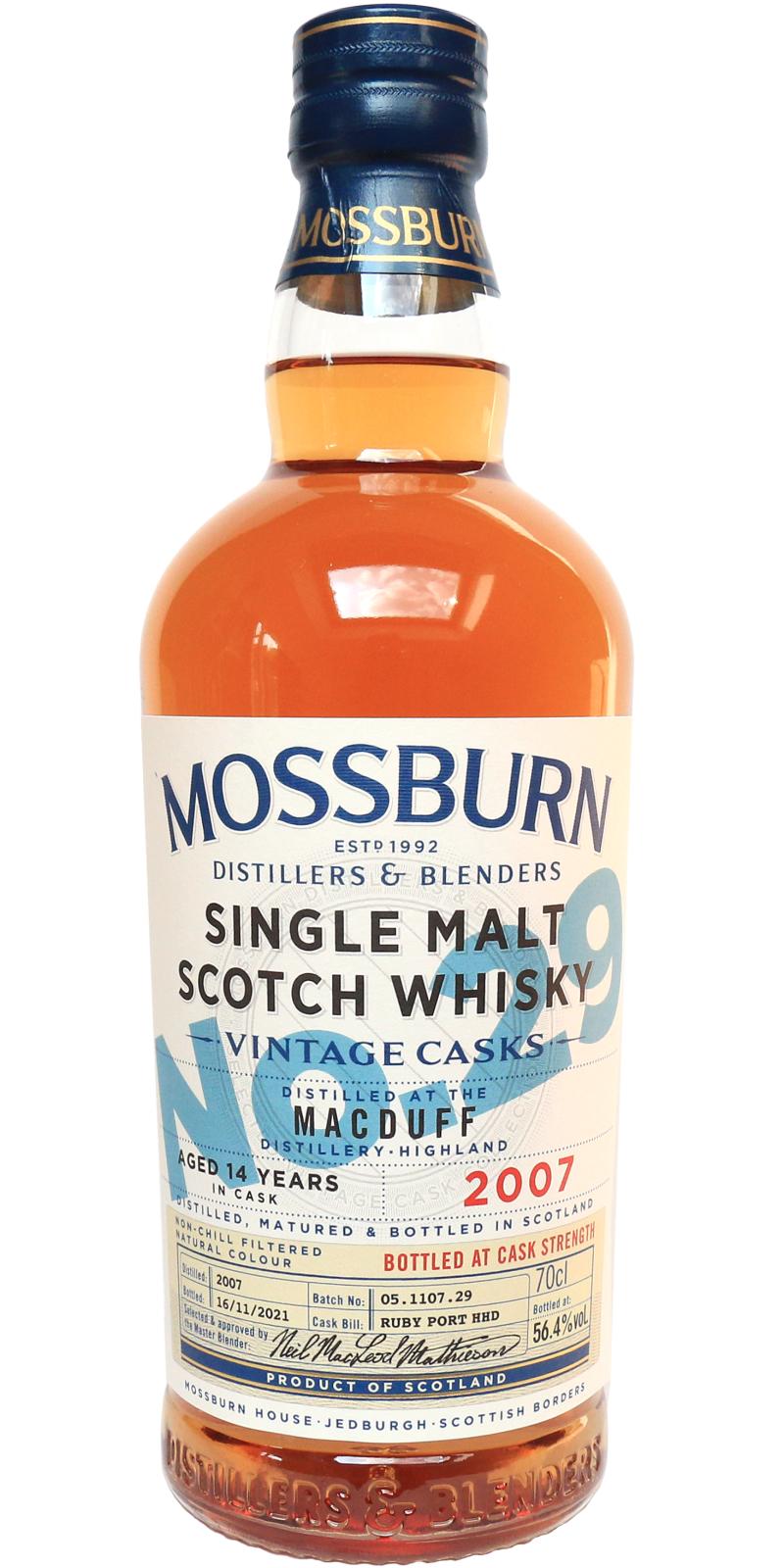 Mossburn Macduff 10yr Single Malt Scotch Whisky No.12 a clear glass bottle with a rounded shoulders with a white label and blue top