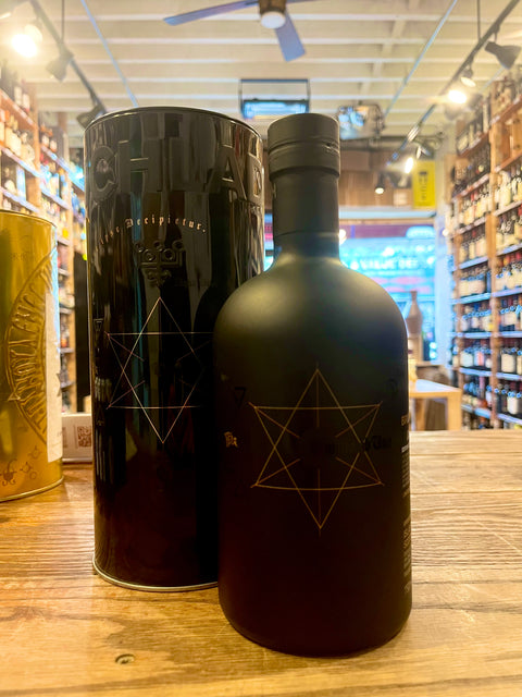 Bruichladdich Black Art short all black bottle with gold six pointed star shape and gift tin with the same design