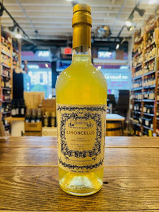 Paolina Limoncello Liquore di Limone di Sorrento 750mL a tall clear glass bottle with a beige label and a golden top