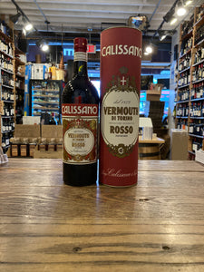 Luigi Calissano Rosso Vermouth di Torino Superiore 750mL a dark bottle with a red and white label next to a tall red cylinder