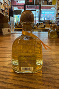 Patron Anejo 200mL clear bottle with cork top. 