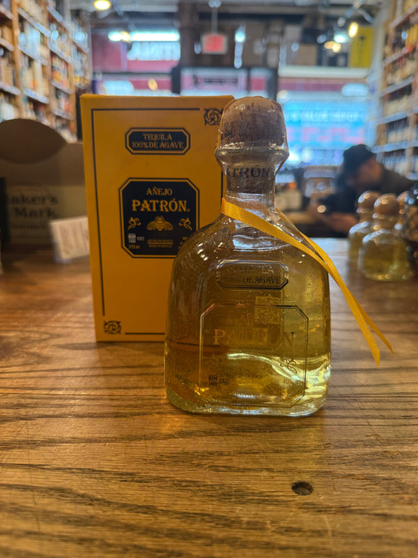 Patron Anejo 375mL clear bottle with cork top.