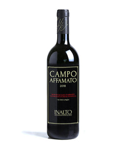 CAMPO AFFAMATO Montepulciano d’Abruzzo a dark wine bottle with a black label with white lettering and black top