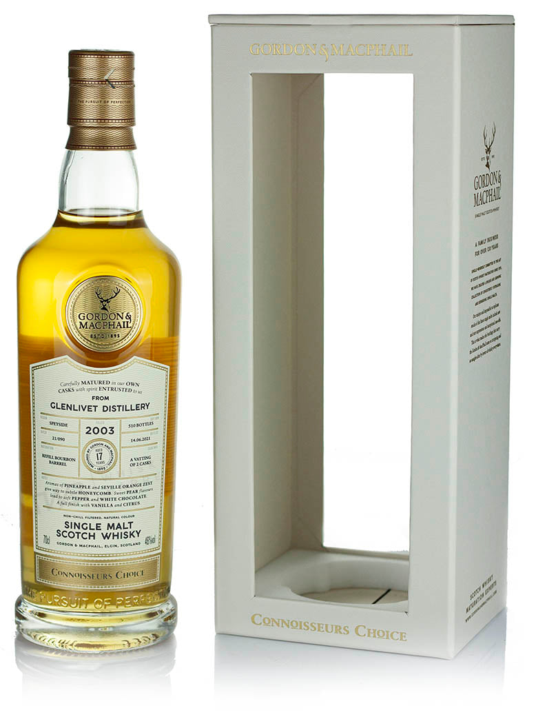 Gordon & MacPhail Connoisseurs Choice Glenlivet 17 Year 2003 a tall clear bottle with a white label and gold top next to an open face tall white box