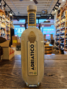 Adriatico Bianco Amaretto 700mL clear bottle with white liquid.