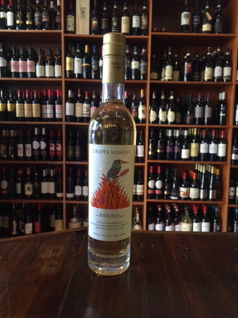 Marolo Grappa Barolo 375ml a small clear glass bottle with a white label and the image of a bird on it with a golden top