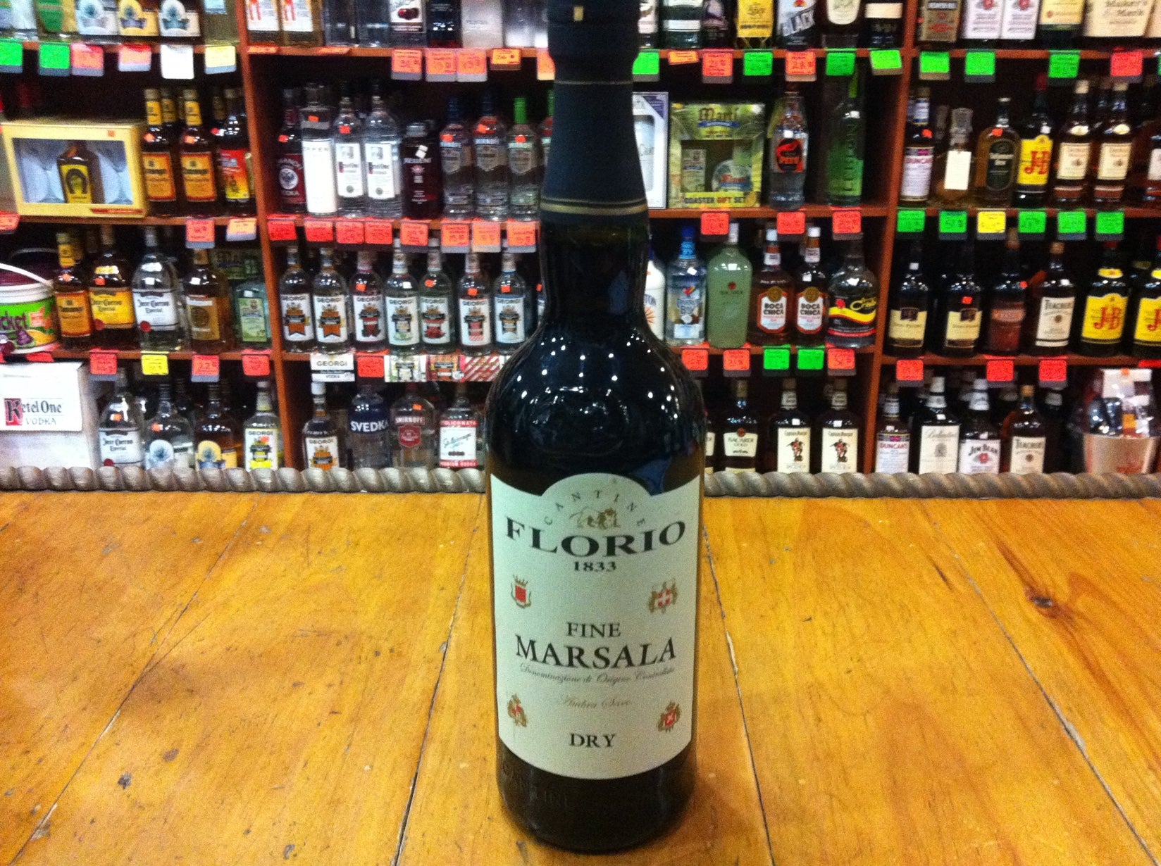Florio Marsala Dry 750ml a dark bottle with a white label and black top