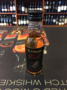 El Dorado Rum Spiced 50ml small clear bottle with a black label and black top