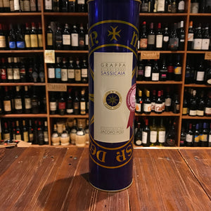 Sassicaia Grappa 375mL a tall slender blue tin cylinder with a white label