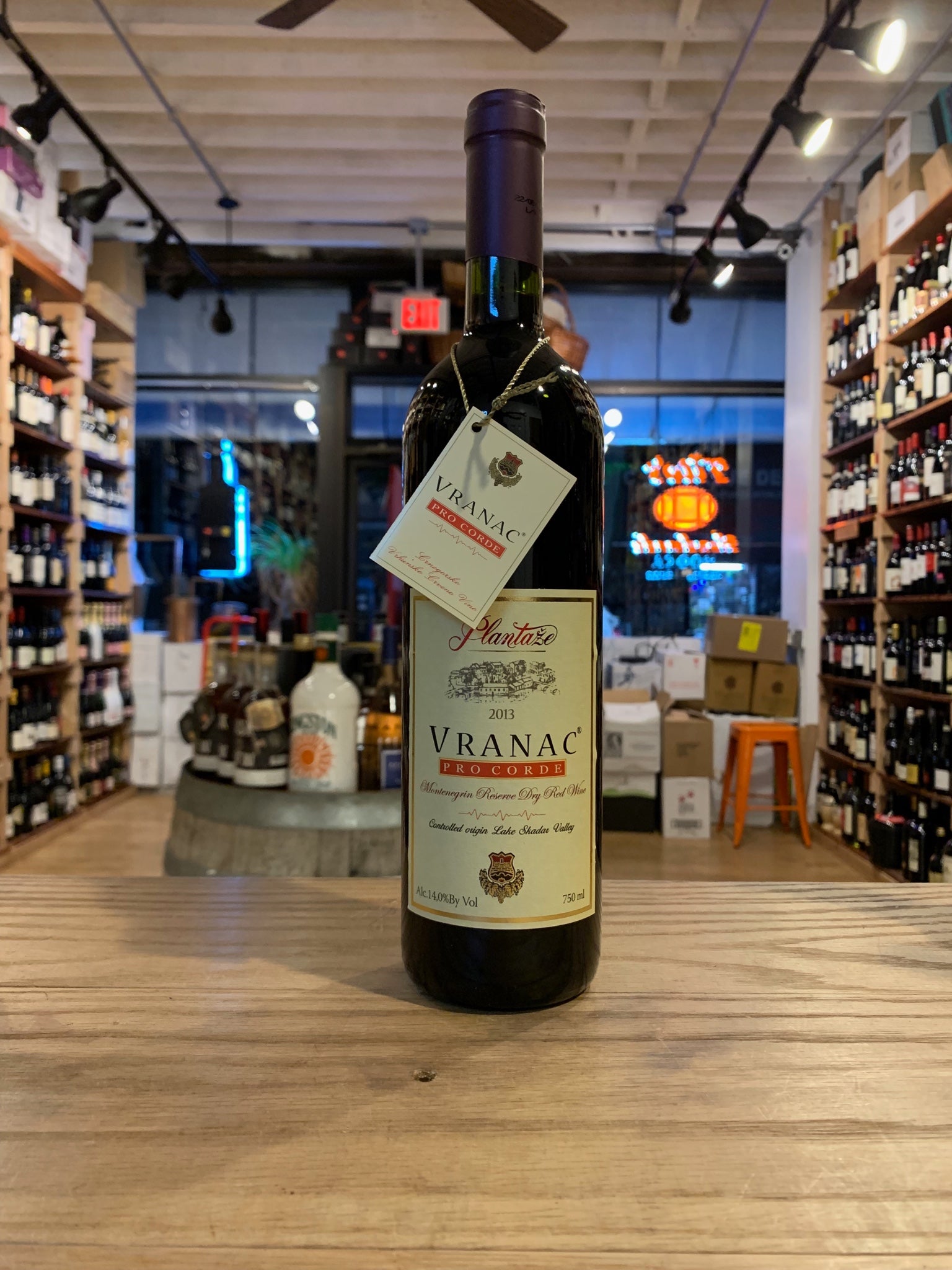 Plantaze Vranac Pro Corde 750mL a dark glass wine bottle with a beige label and purple top