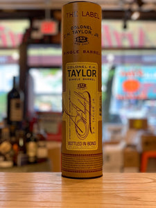 EH Taylor Bourbon Single Barrel 750mL a tall brown cylinder with a yellow label
