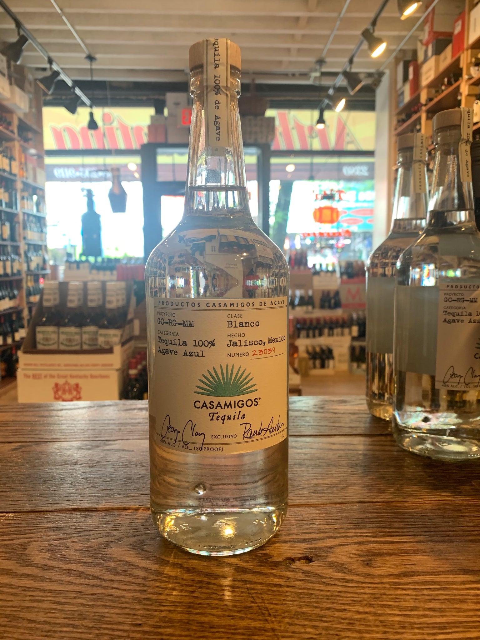 Casamigos Blanco 1L clear bottle with a white label 