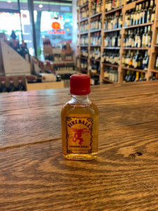 Fireball Cinnamon Whiskey 50mL 66º small flat squared clear bottle with a yellow label and red top