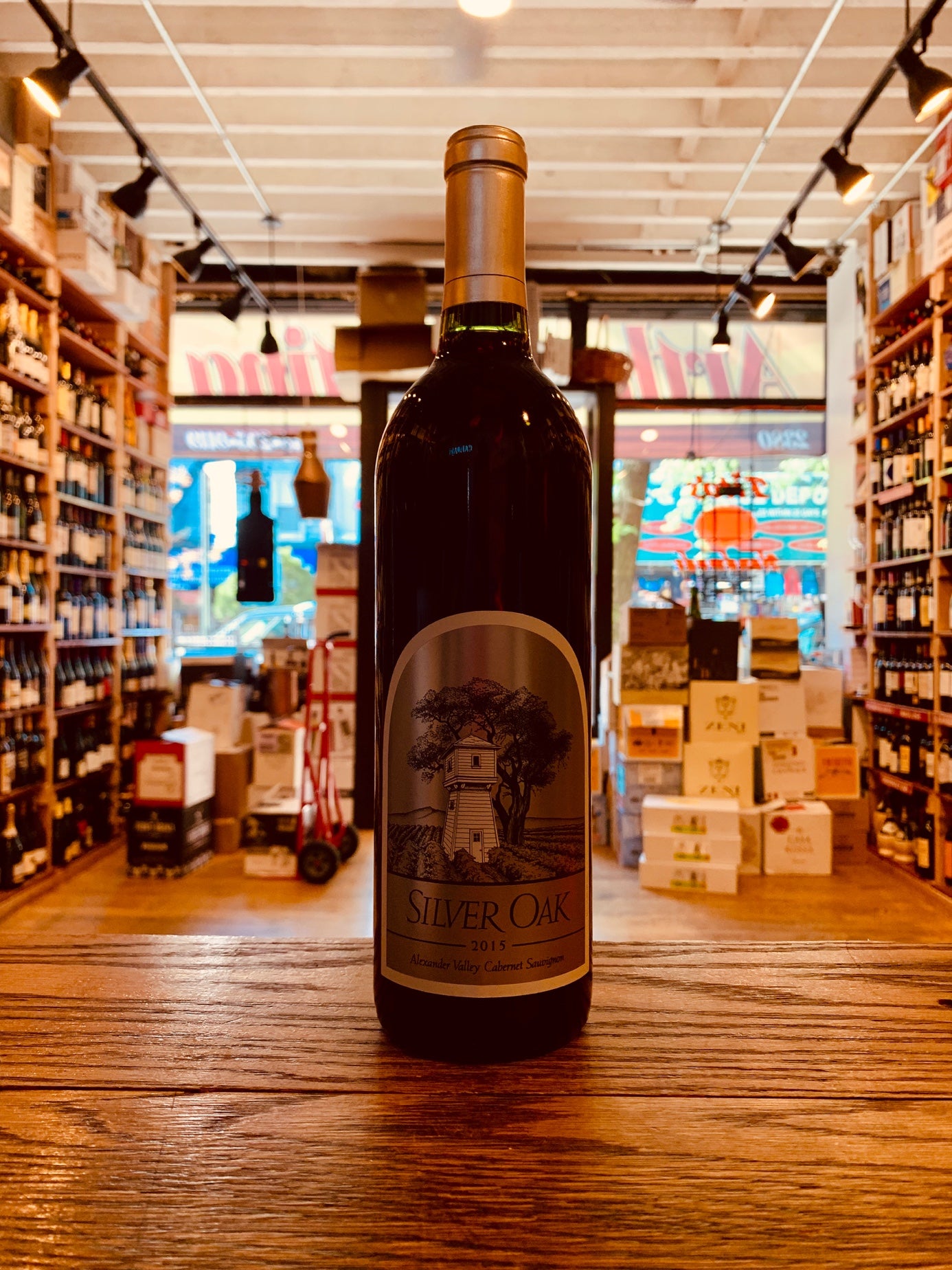 Silver Oak Alexander Cabernet 2017 750mL a tall dark glass wine bottle with a large silver label and silver top