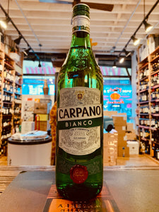 Carpano Bianco Vermouth 1L tall green clear bottle with white labeling and a green top