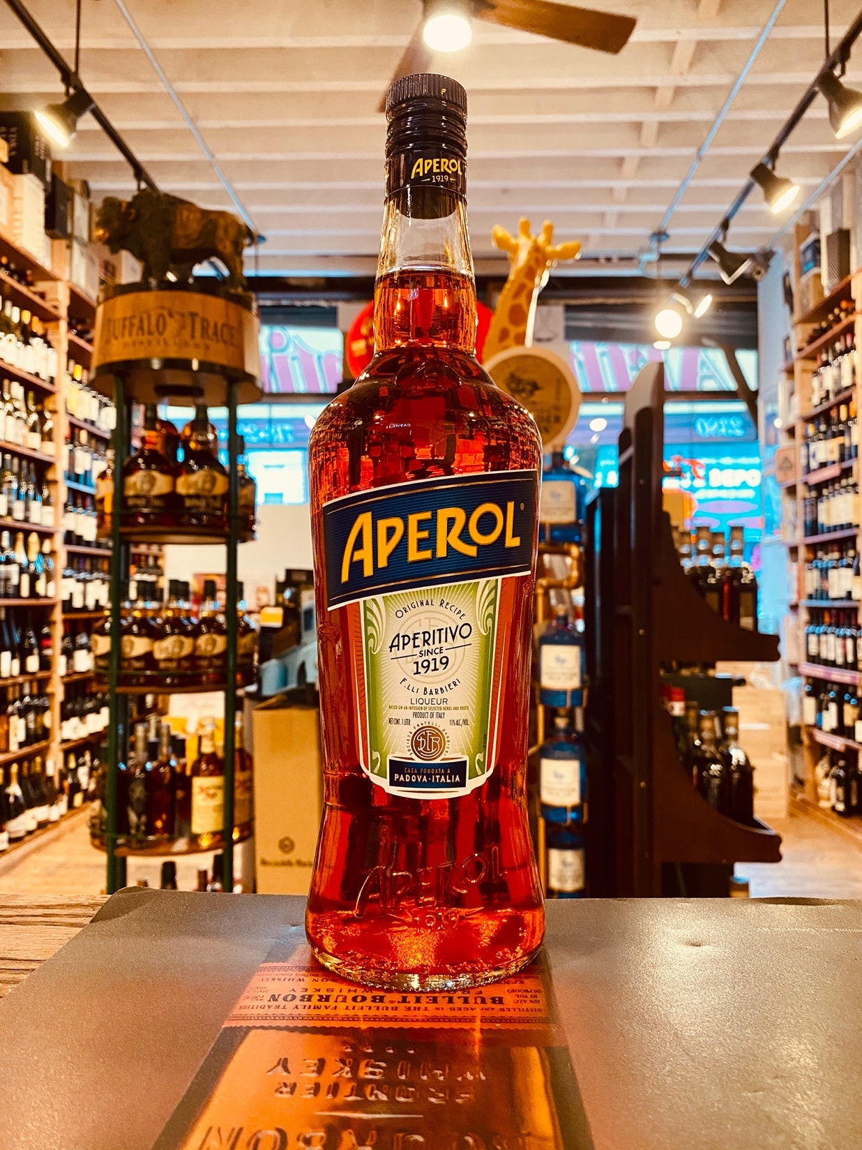 Aperol 1L tall large bottle clear with red liquid 