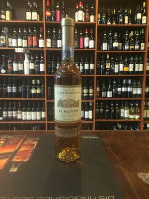 Campobello il Santo 500mL a clear small slender bottle with a rose color liquid and white label with a rose gold top
