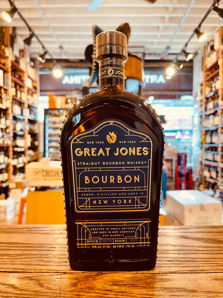Great Jones Bourbon 750mL NY a flat top rounded dark bottle with a short neck and blue and gold label