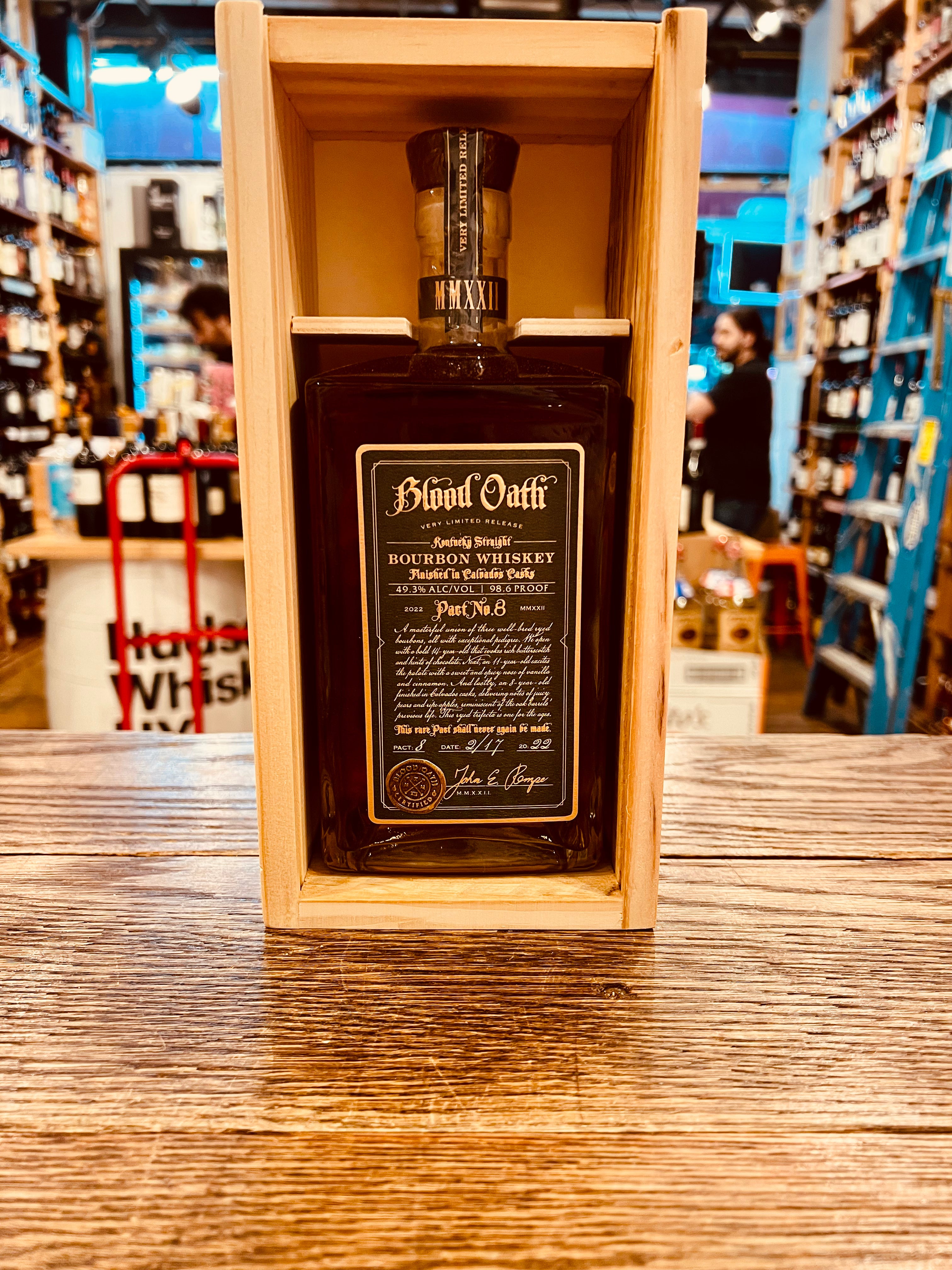 Blood Oath Bourbon Whiskey Pact No 8 750mL a squared clear bottle inside of a wooden square box