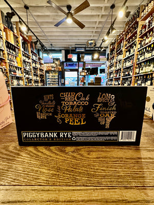 Whistle Pig Piggybank Rye 1L the backside of a rectangle shaped black box with gold and white lettering on it