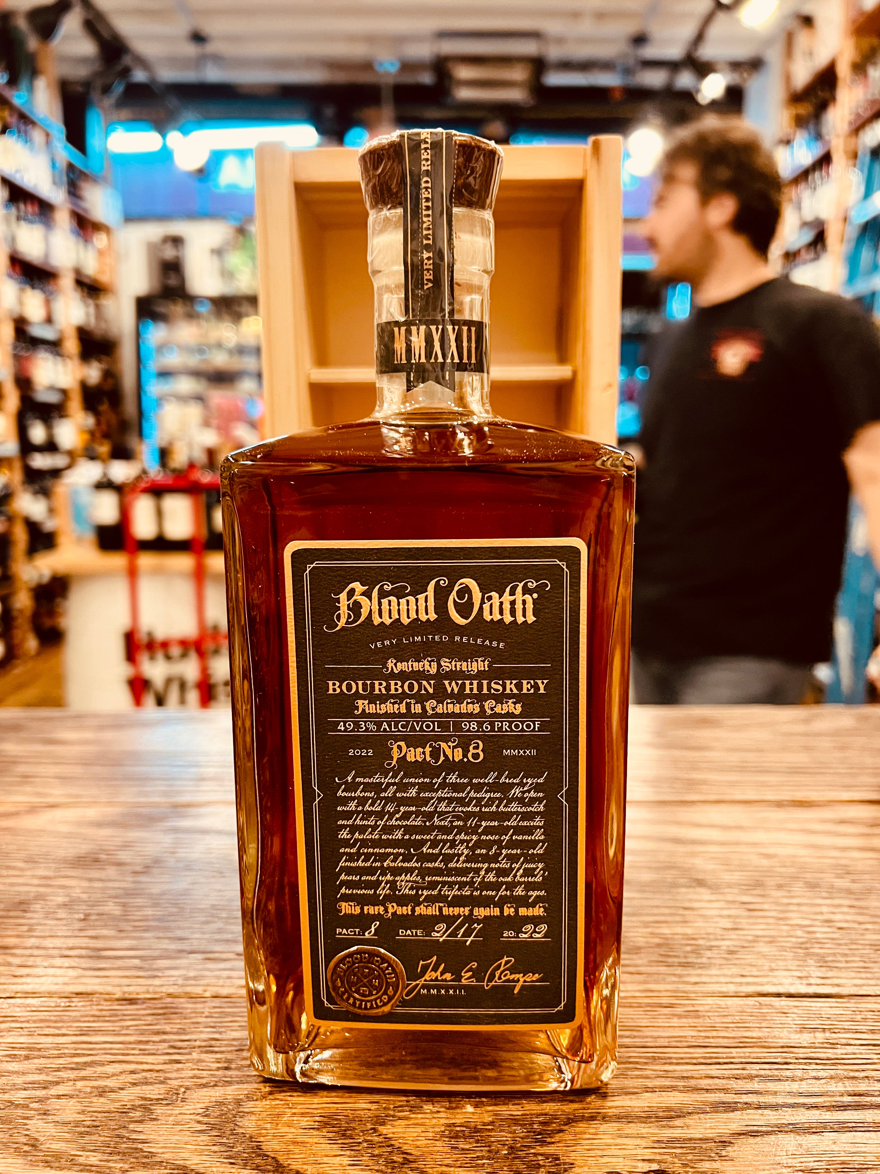 Blood Oath Bourbon Whiskey Pact No 8 750mL a square clear bottle with a dark label and gold lettering