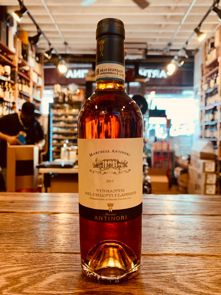 Marchese Antinori Vin Santo Del Chianti Classico DOC 375mL a clear glass bottle with a beige label and a dark teal top
