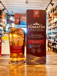 Tomatin Cask Strength 115PF 750mL a robust rounded shouldered clear glass bottle with a red label and red top next to a dark red box
