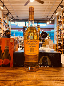Glenmorangie 10yr Single Malt 750mL tall clear bottle with an orange label and golden top