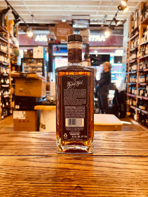Orphan Barrel Muckety Muck 25YR Single Grain Scotch Whisky 750mL the side view of a flat surfaced squared bottle with a black label