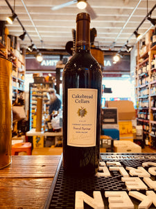 Cakebread Suscol Springs 2018 Cabernet Napa 750mL a dark slender wine bottle with a white label and dark top