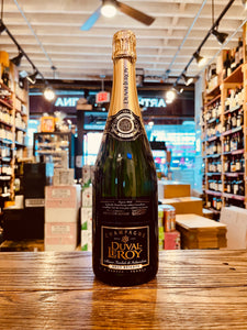 Duval Leroy Cuvee Brut Reserve Champagne 750mL a dark green champagne bottle with a black and gold label, with a golden top