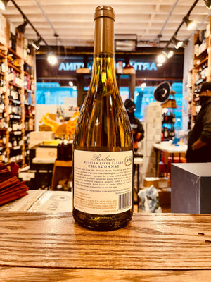 Raeburn Chardonnay 750mL Russian River the backside of a straw color glass wine bottle with a white label and gold top