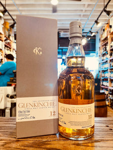 Glenkinchie Single Malt Scotch Whisky 12 Yr 750mL tall gray box with a white label next to a rounded bottle with a white label and gray top