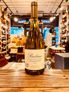 Raeburn Chardonnay 750mL Russian River a straw color glass wine bottle with a white label and gold top