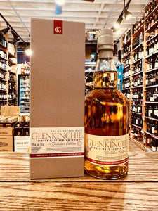 Glenkinchie Distillers Edition 750mL tall gray box with a white label next to a rounded clear bottle with a white label and gray top 