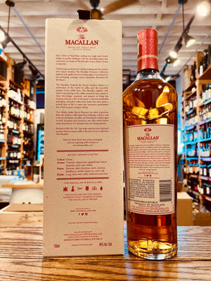 Macallan Harmony Collection 2022 Intense Arabica 750mL the backside of a tall white and red box next to a tall slender clear glass bottle with white and red labeling and red top