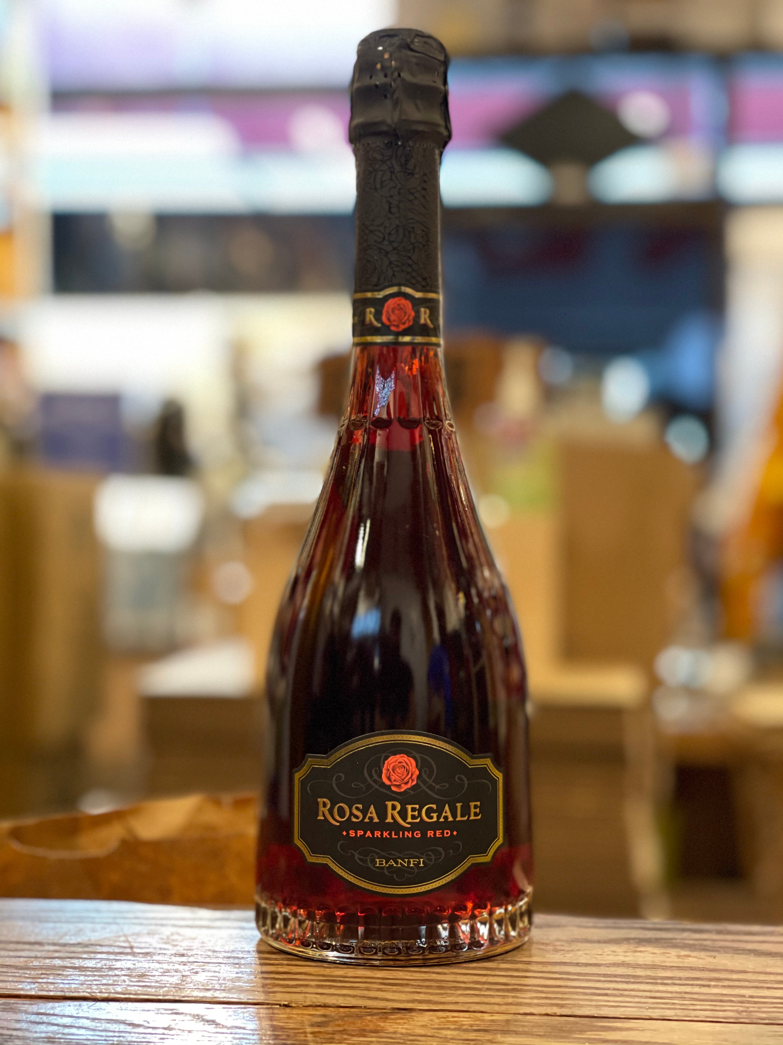 Rosa Regale 750mL a big bottomed glass bottle with a tapered neck, black label and black top