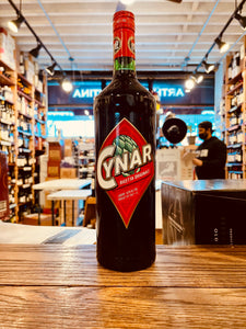 Cynar 1L large tall dark bottle with a red label and red top