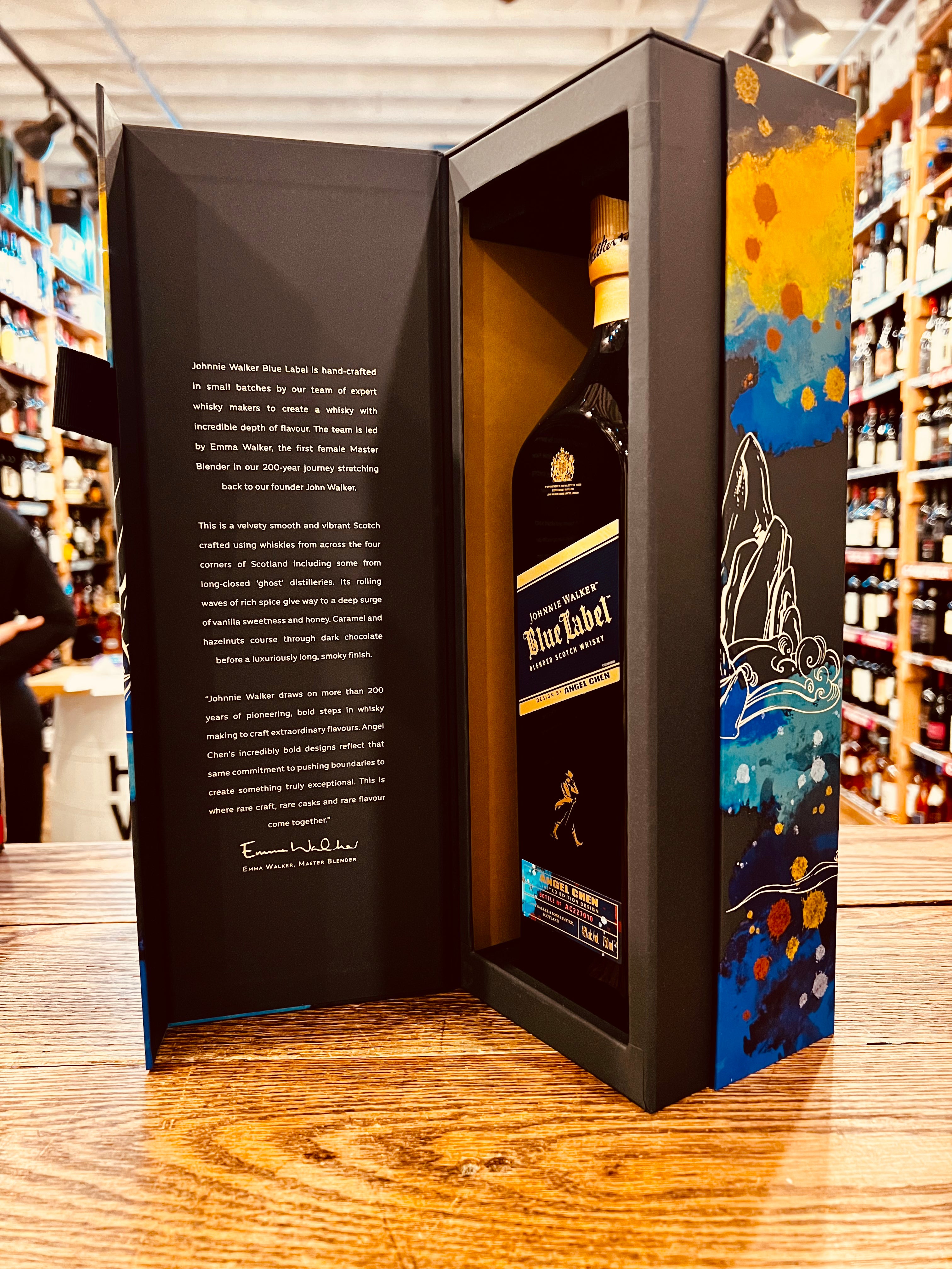 Johnnie Walker Blue Label Year of the Rabbit Scotch Whisky 750mL an open blue box with colorful design on the side of it and a tall squared blue glass bottle inside of the box