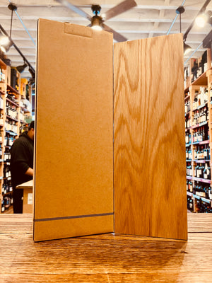 Macallan 25Yr Sherry Oak 750mL a cardboard box next to a wooden box