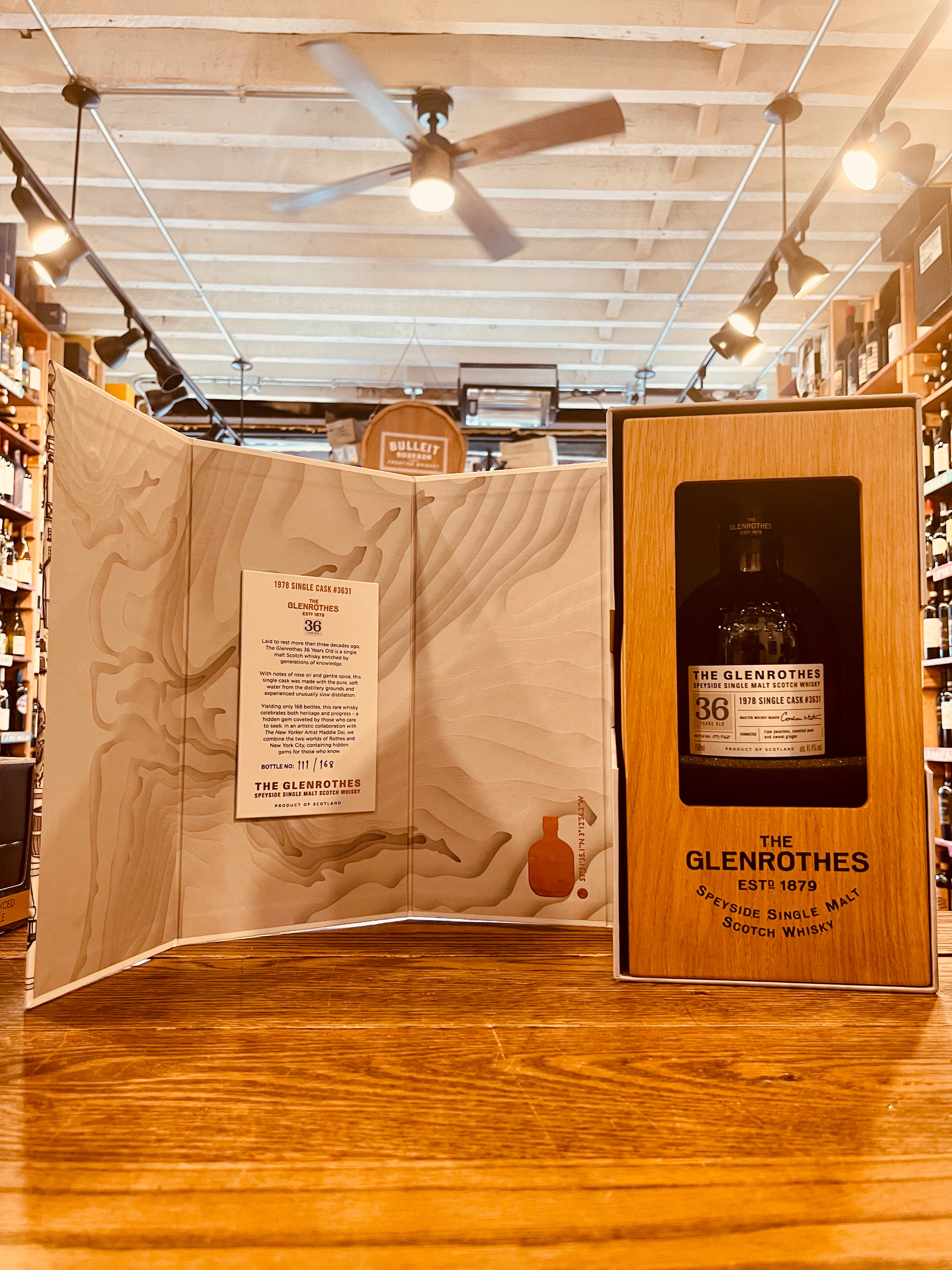 Glenrothes Platinum Single Cask 36Yr 1978 750mL NFT an open white box with a wooden box inside and small squat  round clear bottle inside with a white label