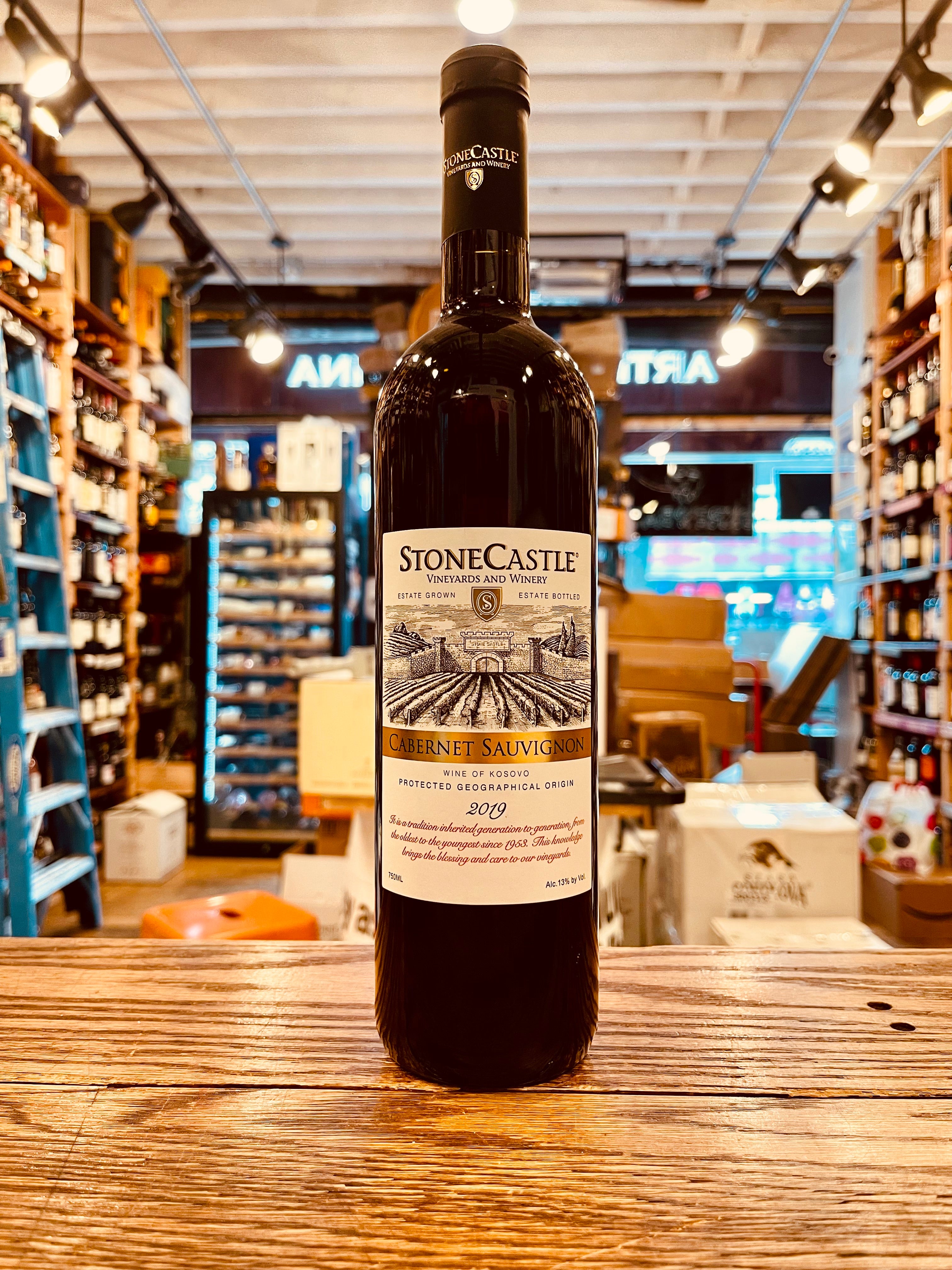 Stone Castle Cabernet 750ml Kosovo a tall slim dark wine bottle with a white label and black top